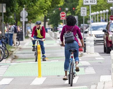 Photograph of a dedicated, protected bike path added to the street network in Ann Arbor, Michigan